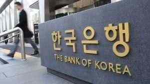 Bank of Korea steadies rate, trims GDP forecast amid virus surge