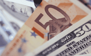 Dollar eases, NZ$ hits two-year high