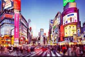 Asian shares surge, hitting new record highs on hopes for global recovery